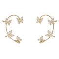Gold-tone butterfly ear cuff pair with clear sparkling accents